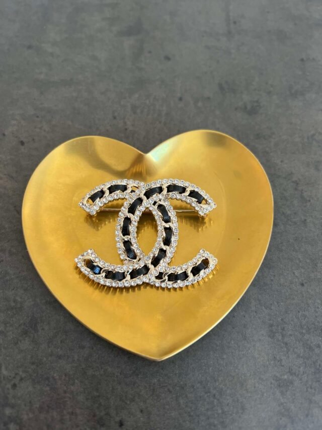 C BLACK & SILVER BROOCH